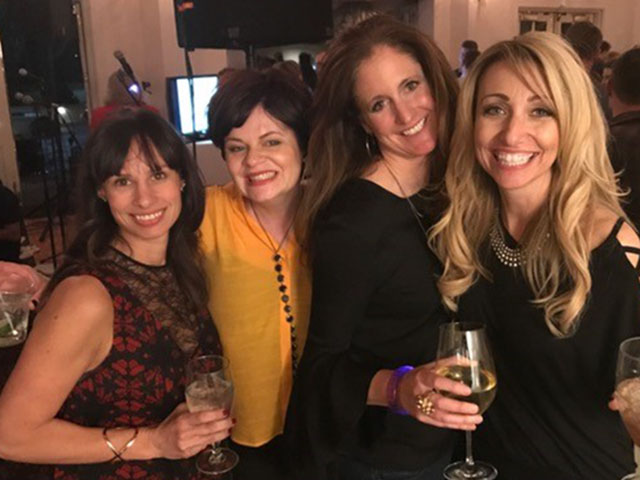 Penny Latta, Lisa Diomede, Megan Scheck and Tami Wanless are part of the Western Auxiliary Board whose members organized the Rock 'N Roll event.